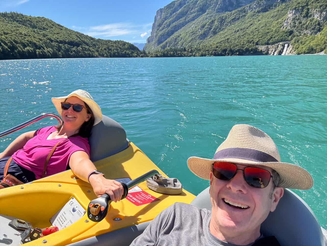 Erin and Simon on a Gogo electric boat in lake Molveno, Italy.