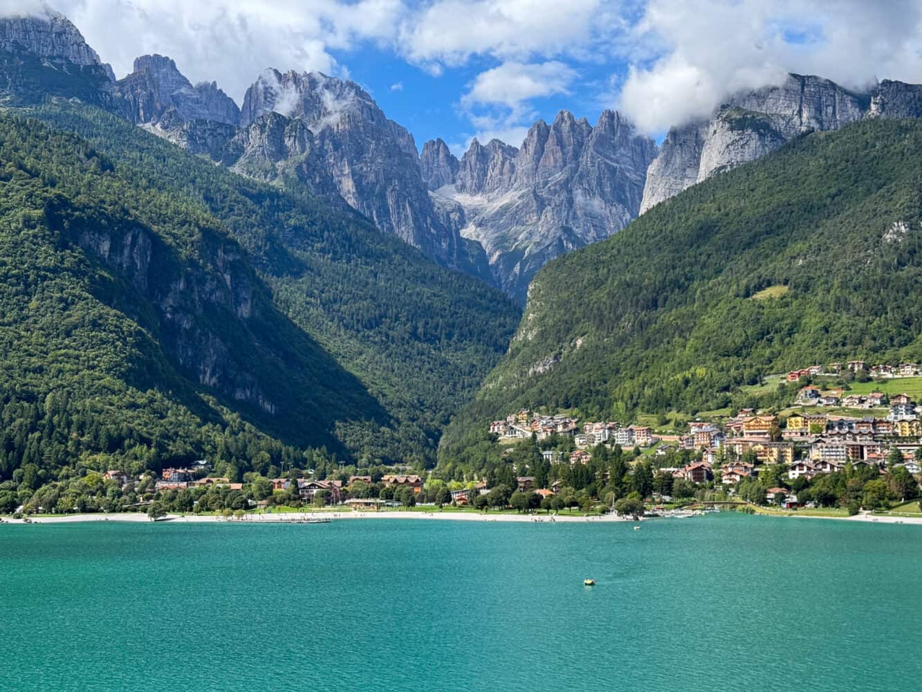 Lake Molveno, Italy with Molveno village and the Brenta Dolomites behind.