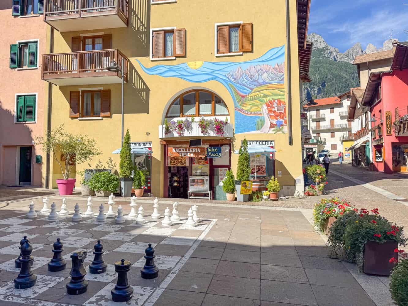Giant chess set in the historic centre of Molveno village, Italy.
