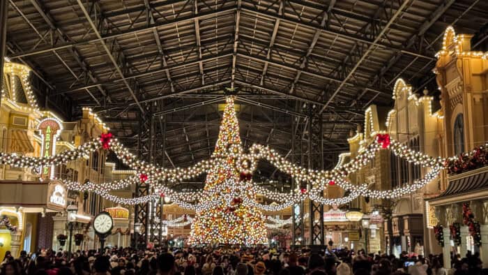 Christmas tree lit up at night in World Bazaar in Tokyo Disneyland, Japan.
