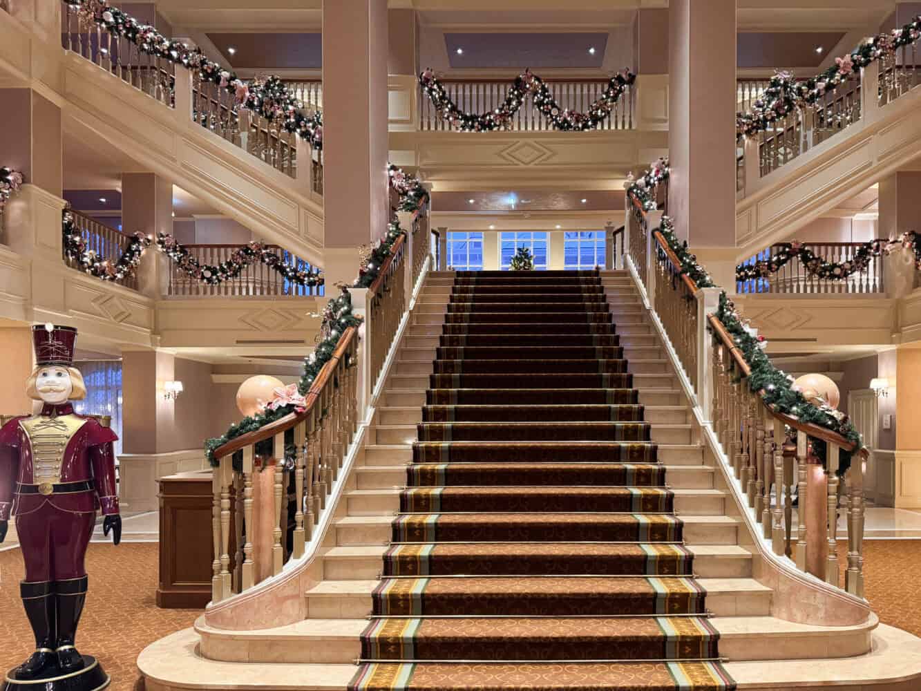 Grand staircase at Disneyland Hotel Paris decorated for Christmas.