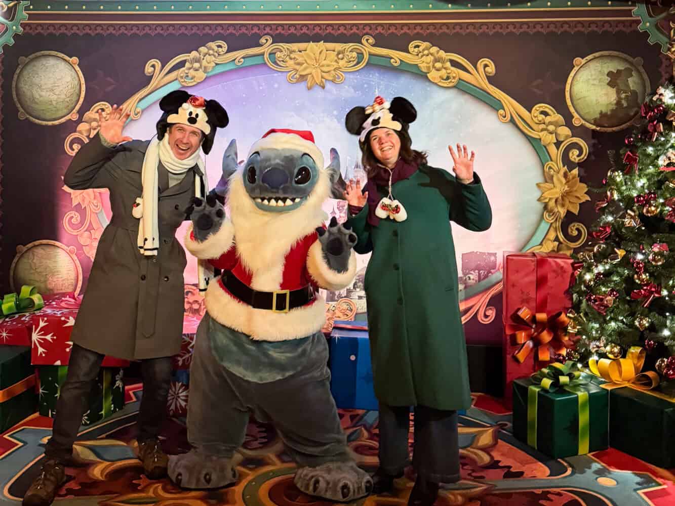 Simon and Erin meeting Santa Stitch at Disneyland Paris' Disney Enchanted Christmas event.