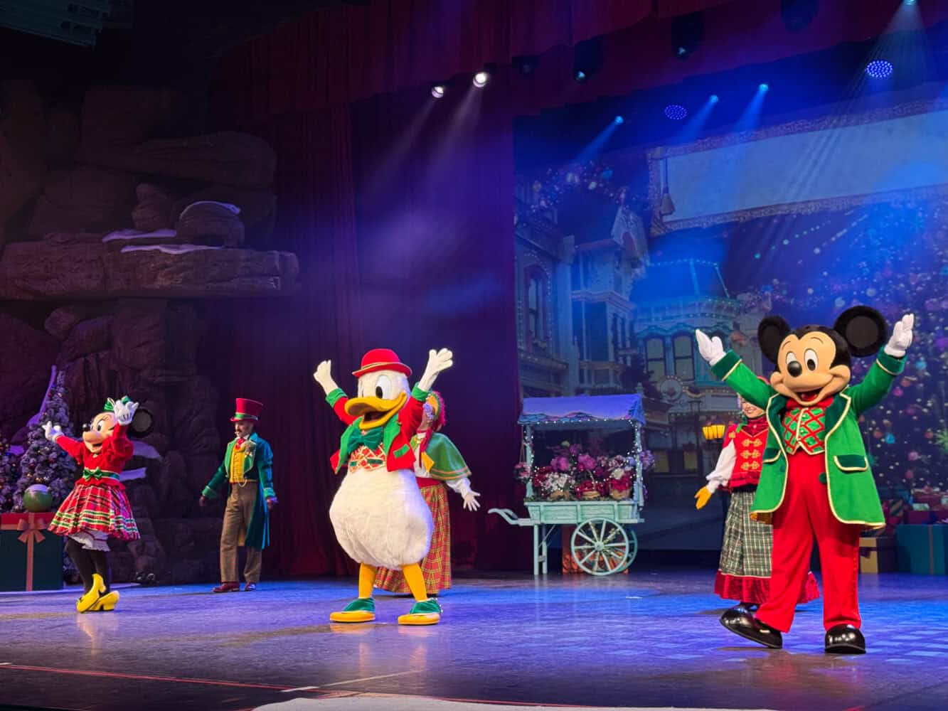 Mickey, Donald and Minnie in the Let's Sing Christmas show at Disneyland Paris.