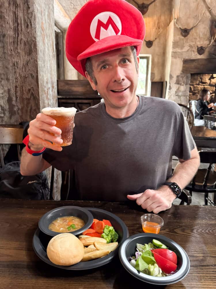 Simon with vegan Irish vegetable stew at Three Broomsticks in Universal Studios Japan. 