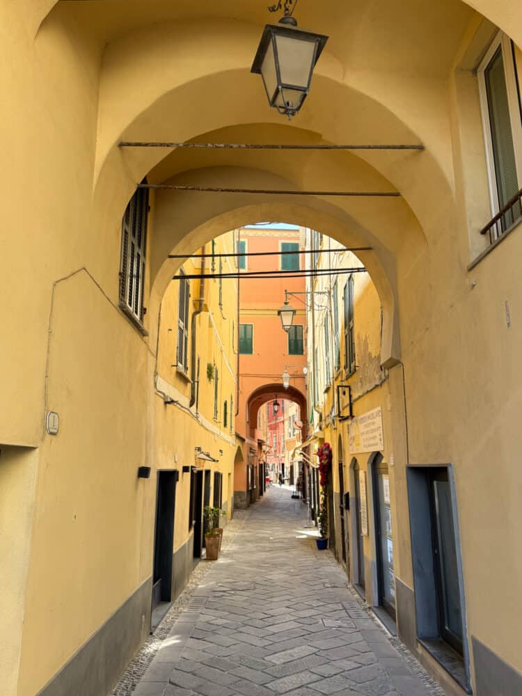 Narrow backstreet in Laigueglia, Italy.
